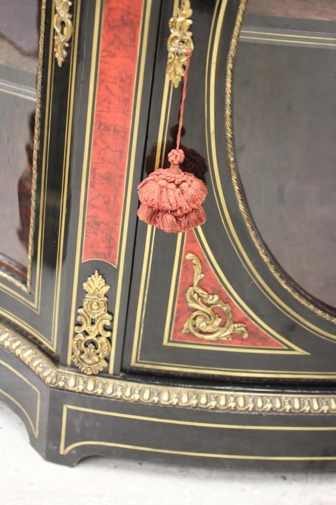 A VICTORIAN EBONISED AND RED TORTOISESHELL CREDENZA of bold serpentine outline with brass inlay and Image