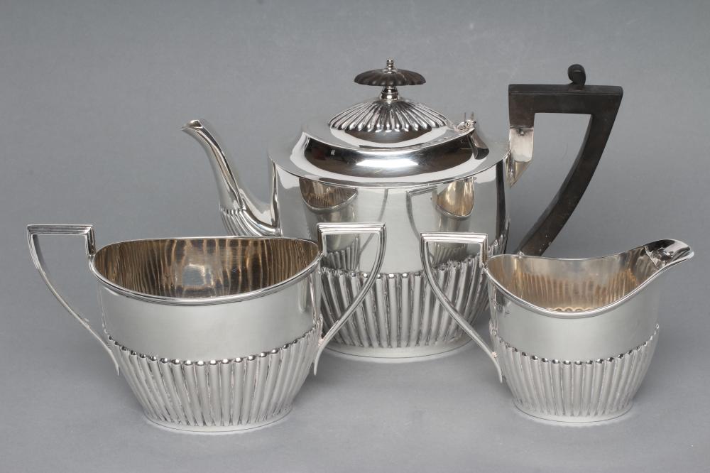 A BACHELOR'S THREE PIECE SILVER TEA SERVICE Image