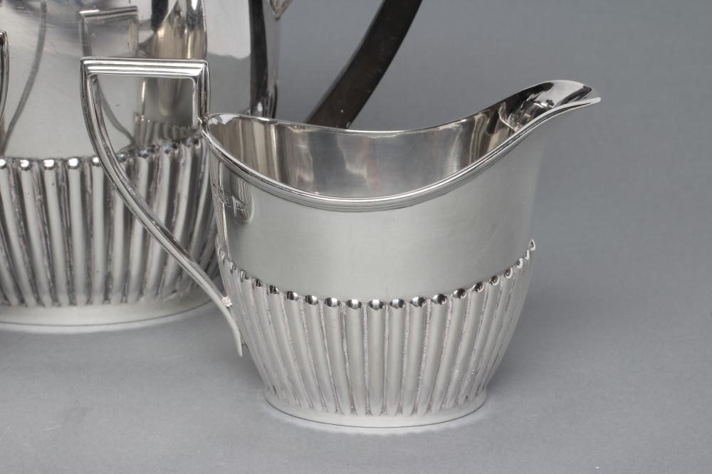 A BACHELOR'S THREE PIECE SILVER TEA SERVICE Image