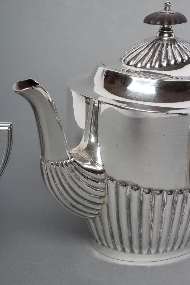 A BACHELOR'S THREE PIECE SILVER TEA SERVICE Image