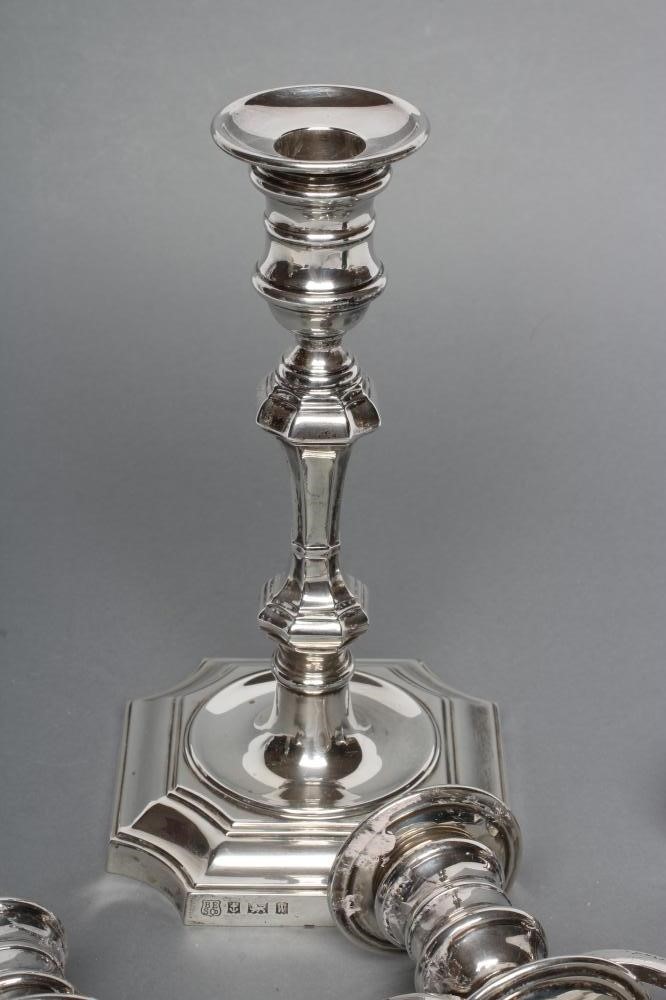 A GEORGE II STYLE TWO BRANCH THREE LIGHT SILVER CANDELABRUM Image