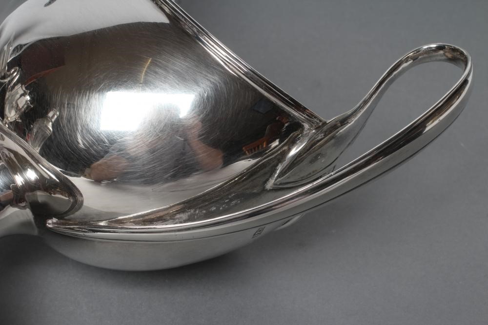 A PAIR OF SILVER PEDESTAL SAUCEBOATS Image