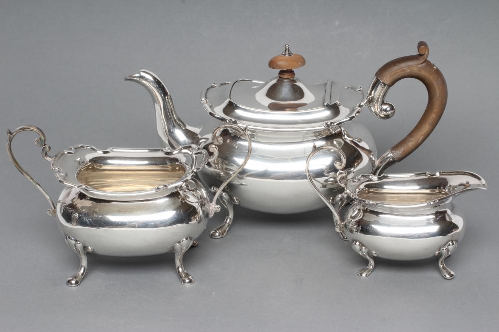 A SILVER THREE PIECE TEA SERVICE Image