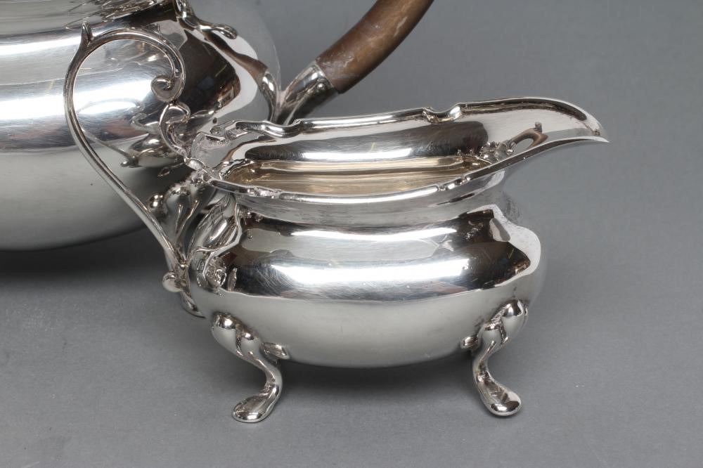 A SILVER THREE PIECE TEA SERVICE Image