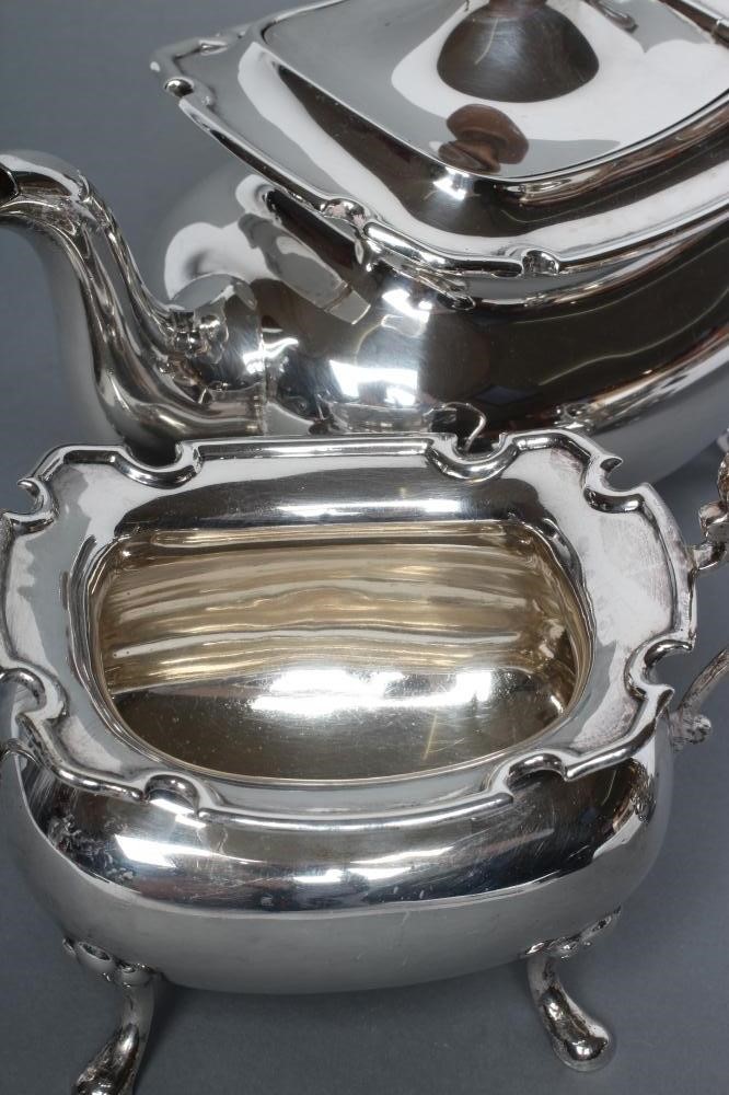A SILVER THREE PIECE TEA SERVICE Image