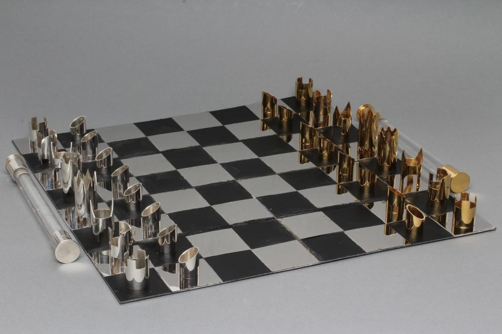 A LIMITED EDITION SILVER TRAVELLING CHESS SET Image