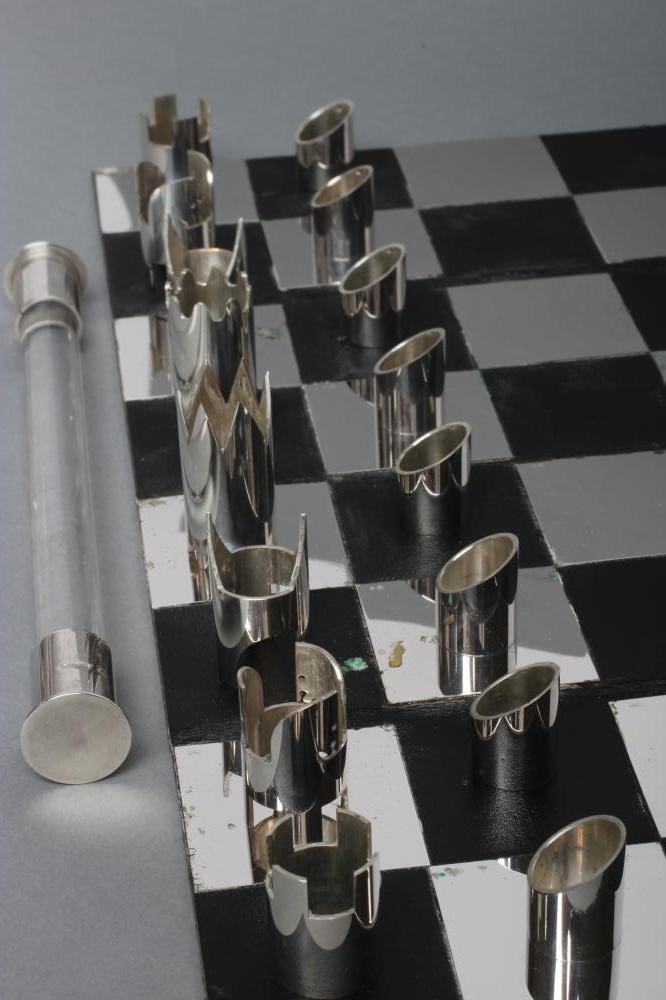 A LIMITED EDITION SILVER TRAVELLING CHESS SET Image