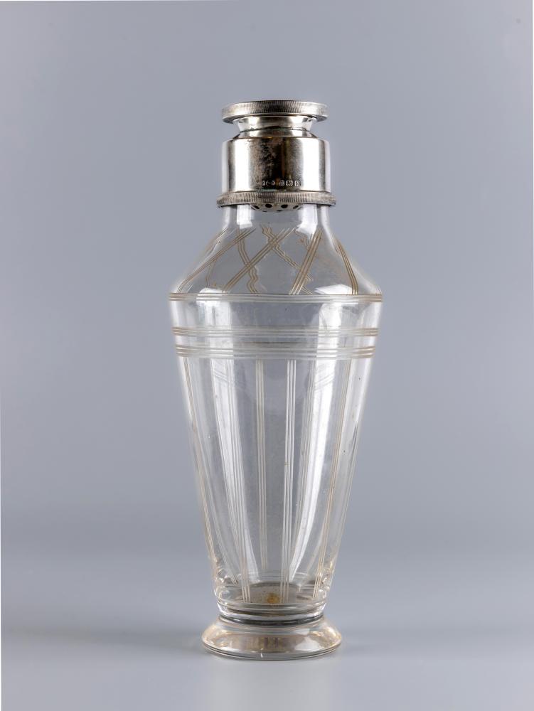 AN ART DECO SILVER MOUNTED CLEAR GLASS COCKTAIL SHAKER Image