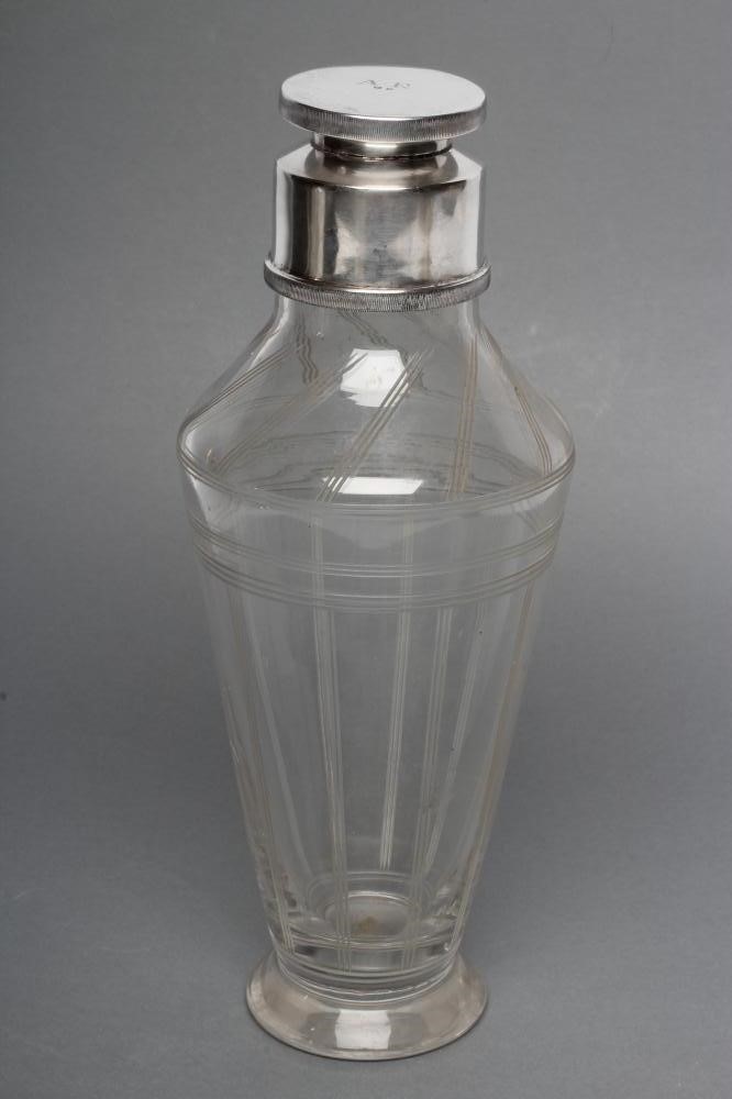 AN ART DECO SILVER MOUNTED CLEAR GLASS COCKTAIL SHAKER Image