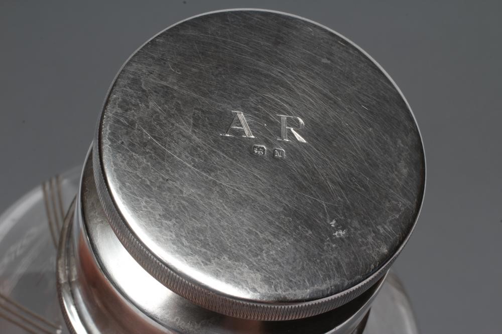 AN ART DECO SILVER MOUNTED CLEAR GLASS COCKTAIL SHAKER Image