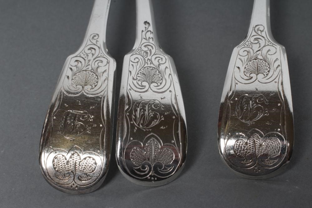 A SET OF THREE VICTORIAN SCOTTISH SILVER CREAM LADLES Image