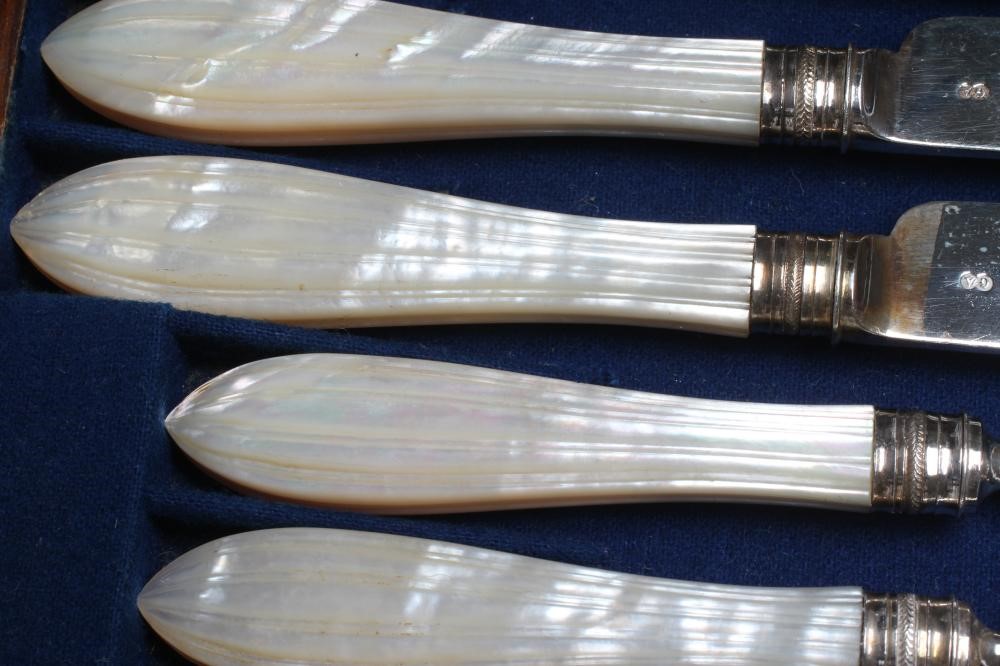 A SET OF TWELVE VICTORIAN SILVER DESSERT KNIVES AND FORKS Image