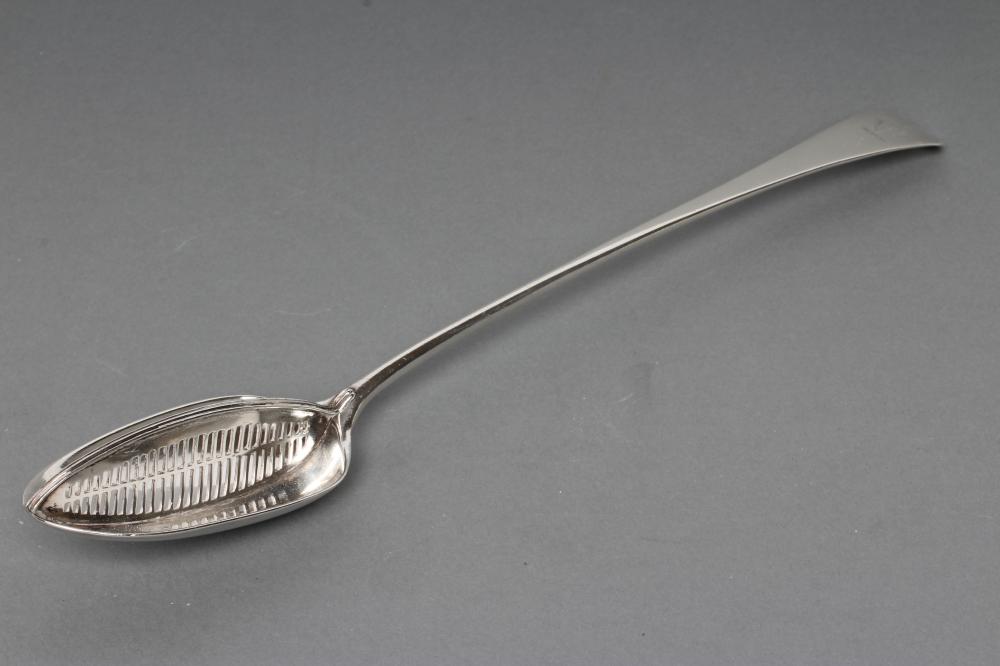 A GEORGE III SILVER STRAINER SPOON Image