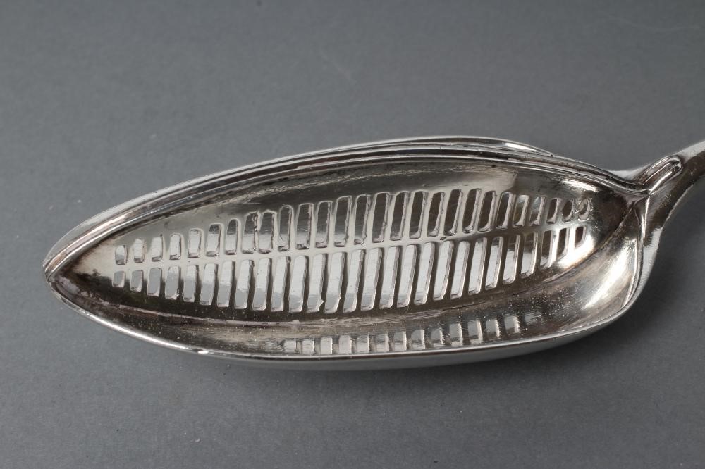 A GEORGE III SILVER STRAINER SPOON Image