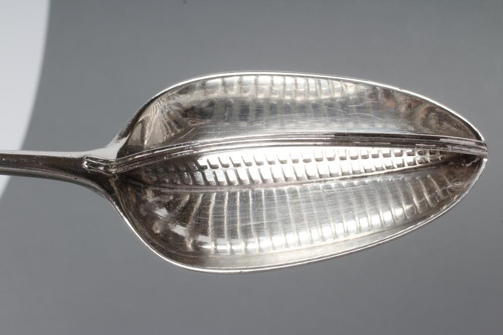 A GEORGE III SILVER STRAINER SPOON Image