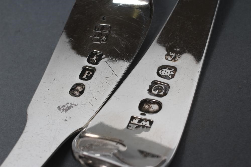 A PAIR OF EDWARDIAN SILVER CREAM LADLES Image