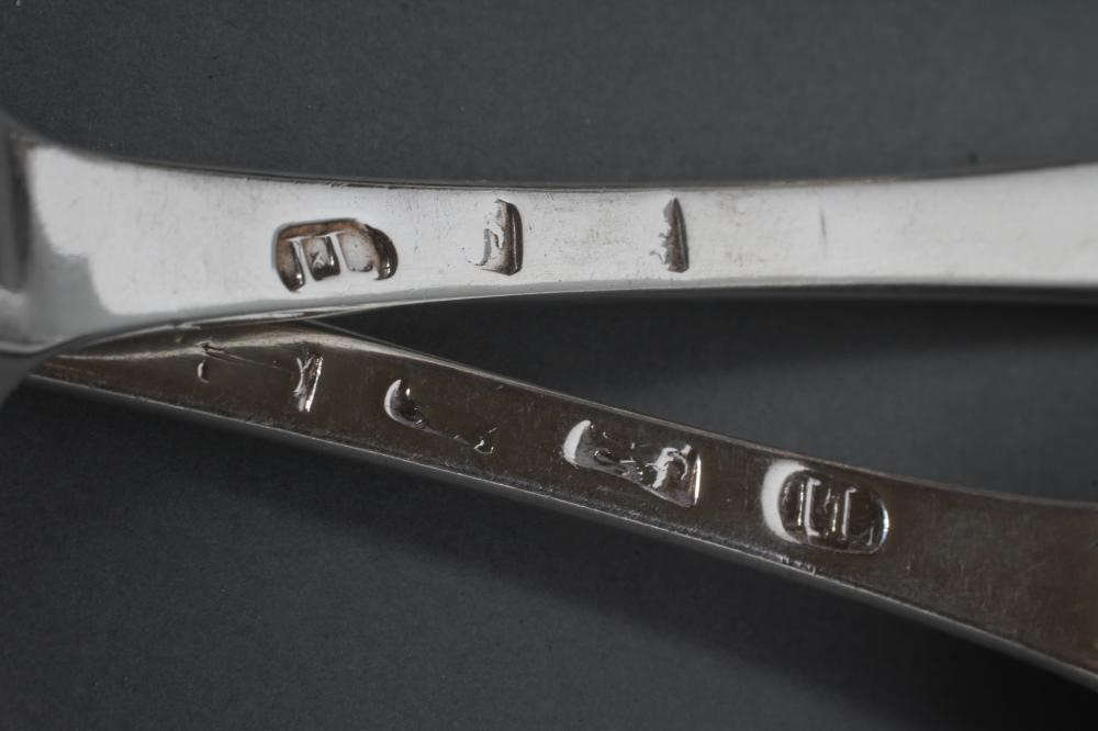 A SET OF FOUR GEORGE II SILVER TABLESPOONS Image