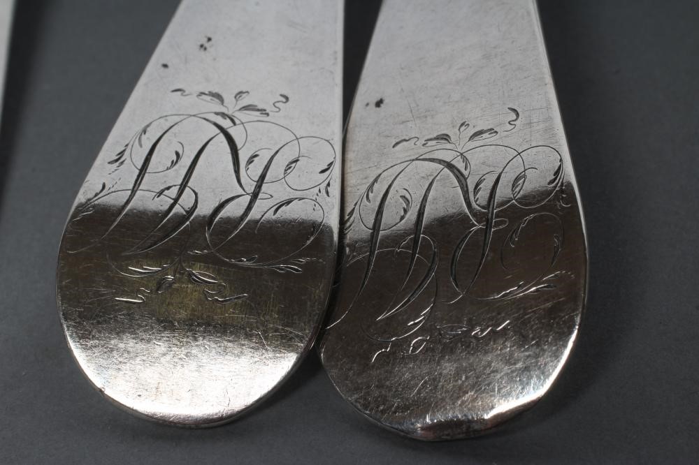 A PAIR OF GEORGE II FANCY BACK SILVER TABLESPOONS Image