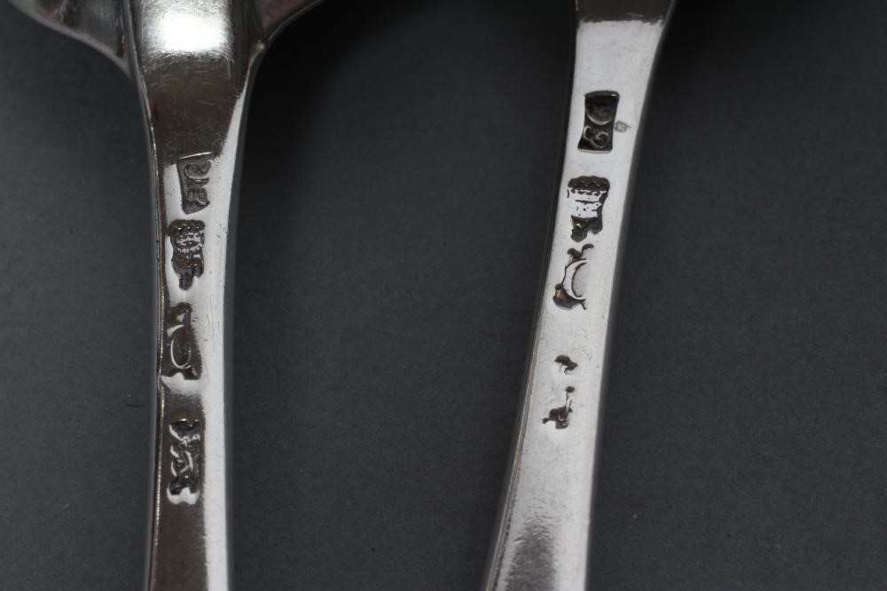 A PAIR OF GEORGE II FANCY BACK SILVER TABLESPOONS Image
