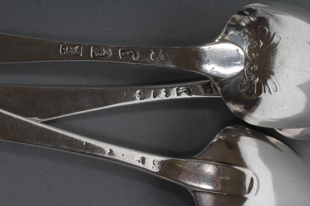A PAIR OF GEORGE II FANCY BACK SILVER TABLESPOONS Image