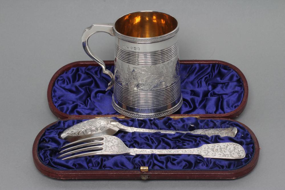 A LATE GEORGE III SILVER CHRISTENING MUG Image