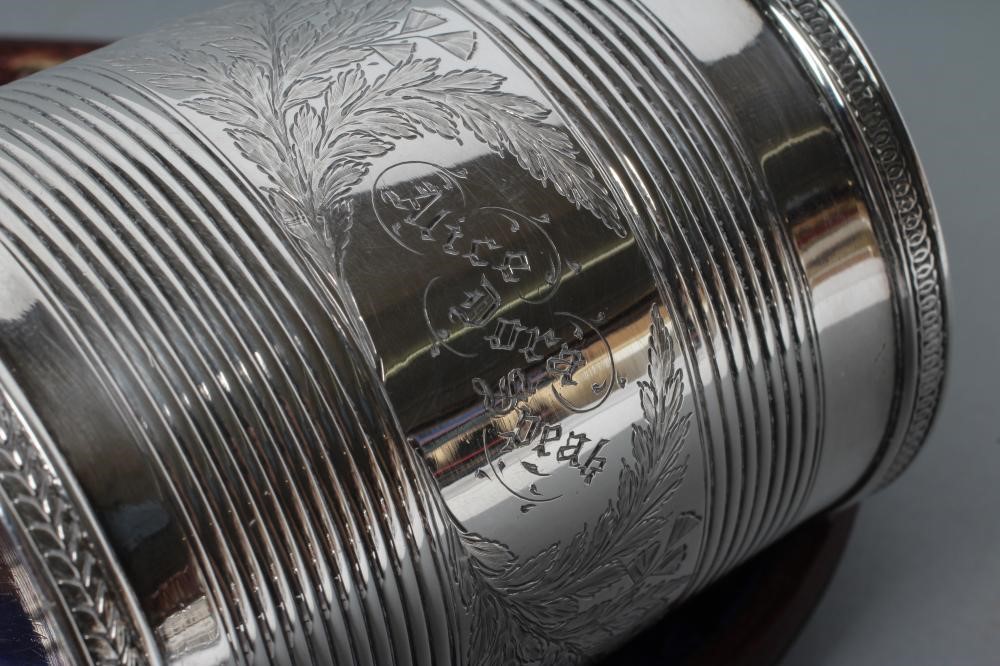 A LATE GEORGE III SILVER CHRISTENING MUG Image