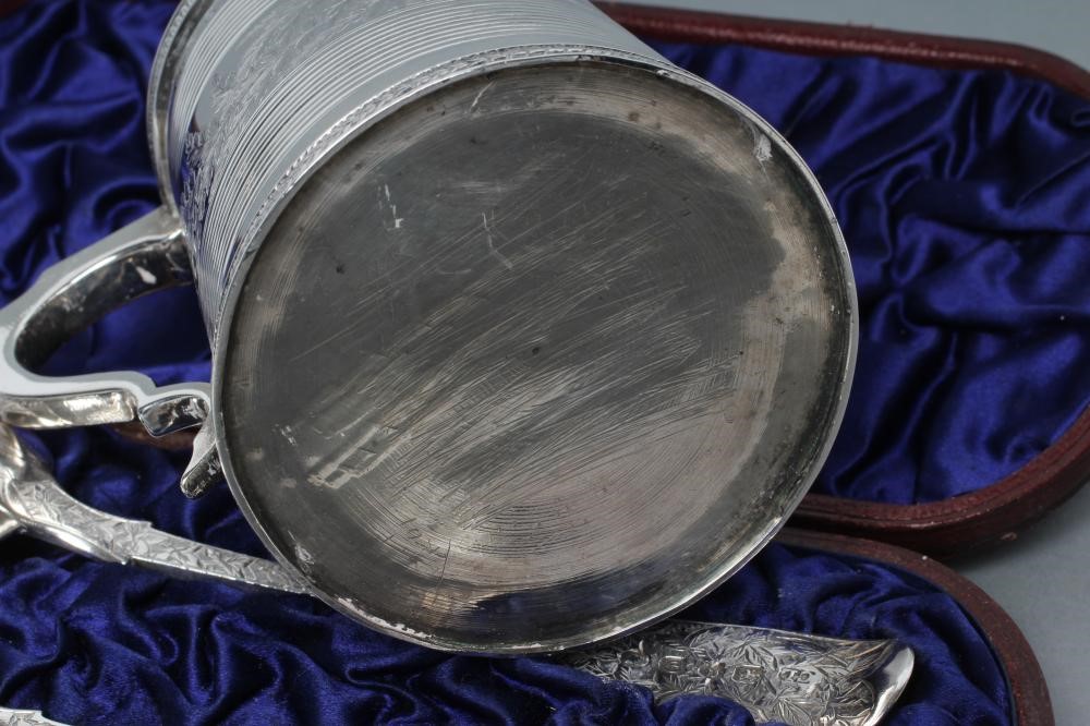 A LATE GEORGE III SILVER CHRISTENING MUG Image