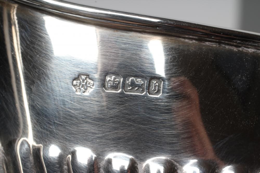 A SILVER COMPOSITE THREE PIECE TEA SERVICE Image
