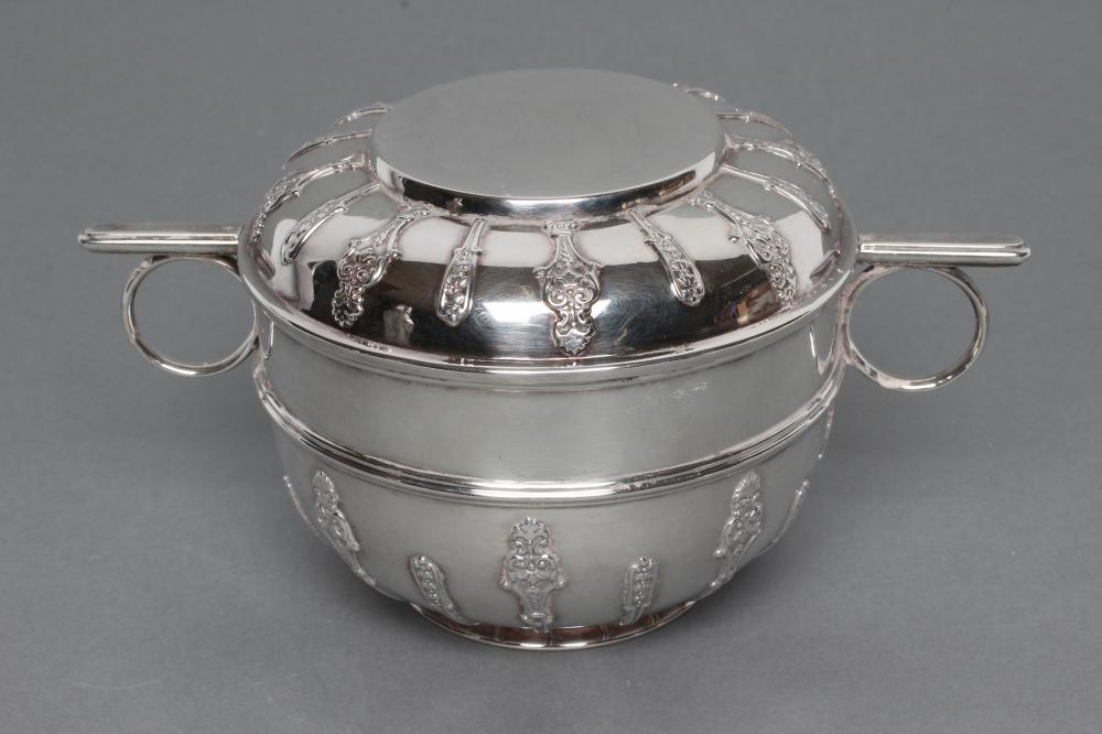 A LATE VICTORIAN SILVER ARTS AND CRAFTS PORRINGER AND COVER Image