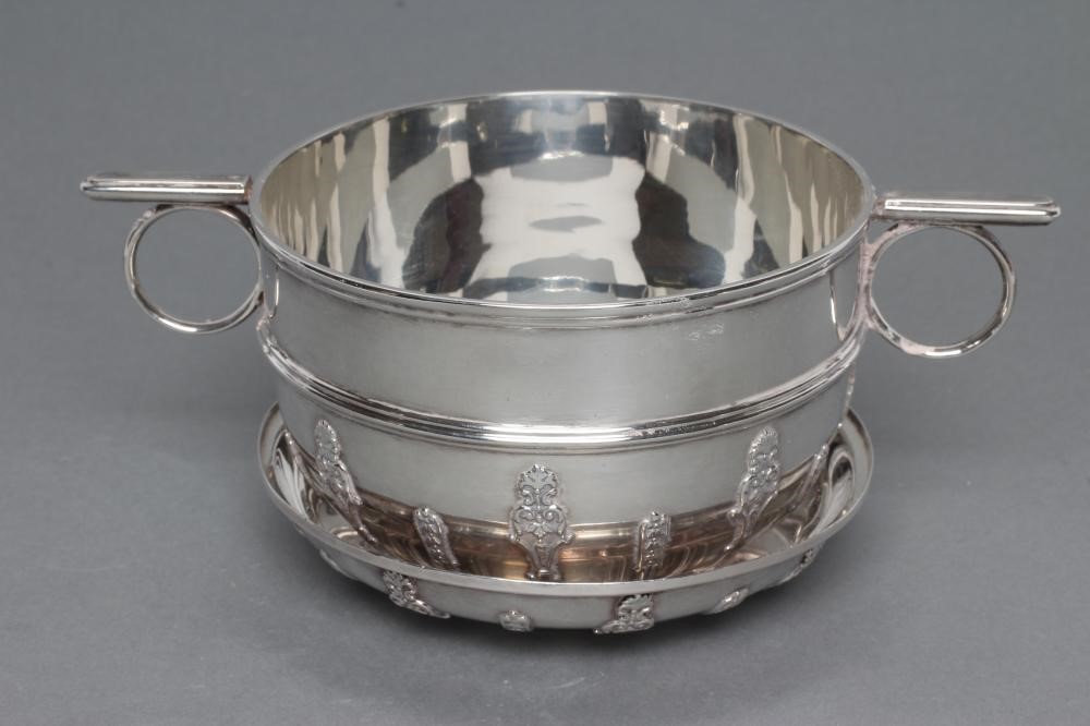 A LATE VICTORIAN SILVER ARTS AND CRAFTS PORRINGER AND COVER Image