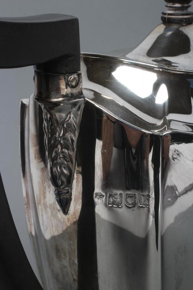 AN EDWARDIAN SILVER COFFEE POT Image