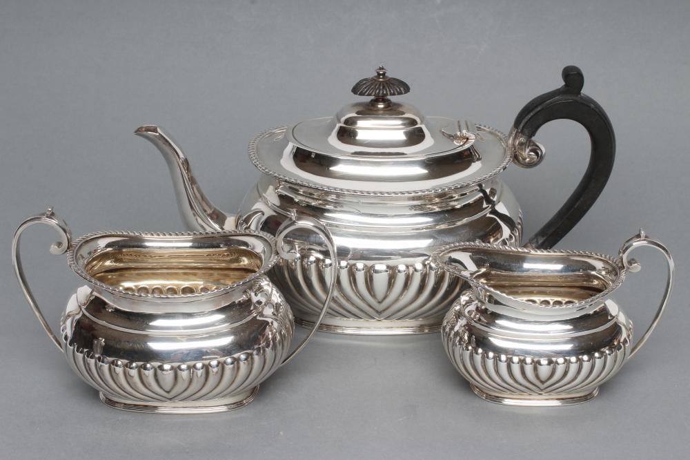 A BACHELOR'S LATE VICTORIAN SILVER THREE PIECE TEA SERVICE Image