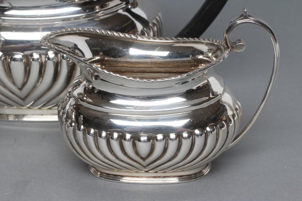 A BACHELOR'S LATE VICTORIAN SILVER THREE PIECE TEA SERVICE Image
