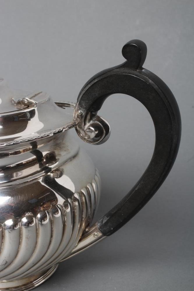 A BACHELOR'S LATE VICTORIAN SILVER THREE PIECE TEA SERVICE Image