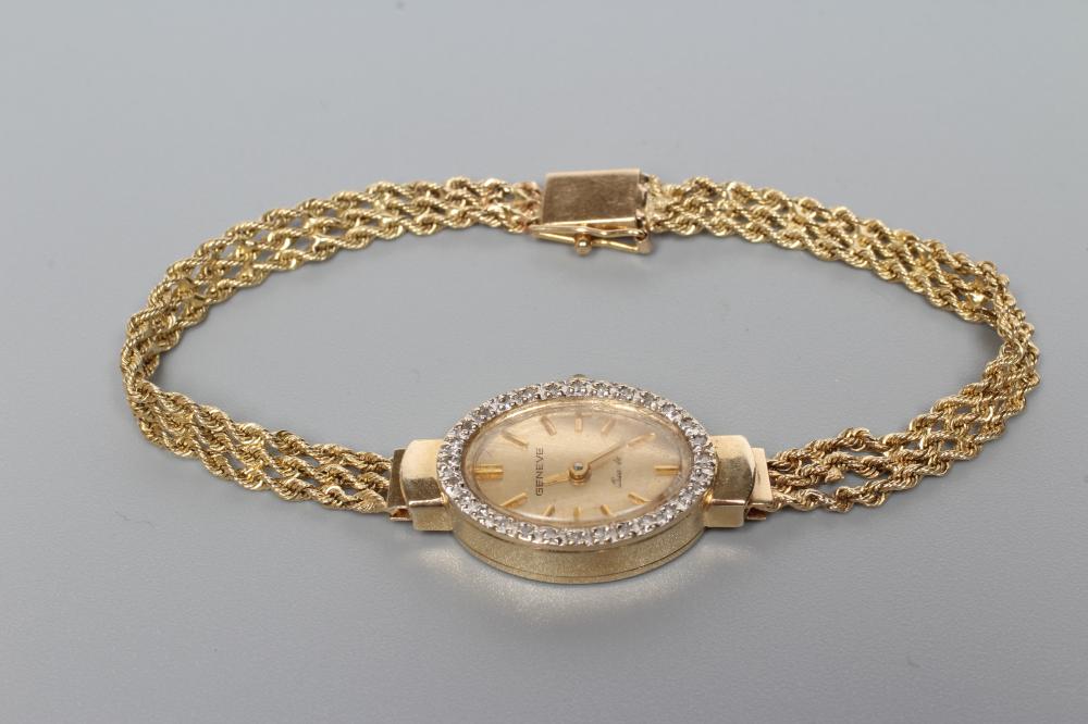 A LADY'S 9CT GOLD COCKTAIL WATCH Image
