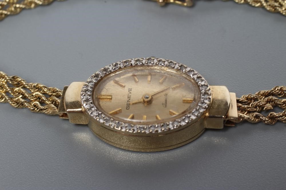 A LADY'S 9CT GOLD COCKTAIL WATCH Image