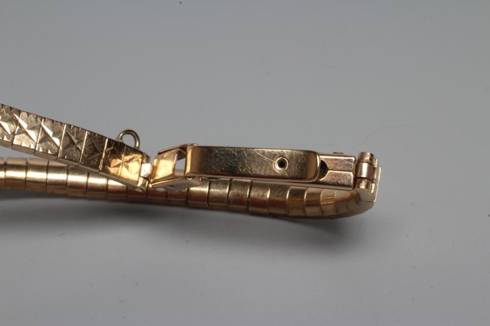 A LADY'S 9CT GOLD OMEGA WRISTWATCH Image