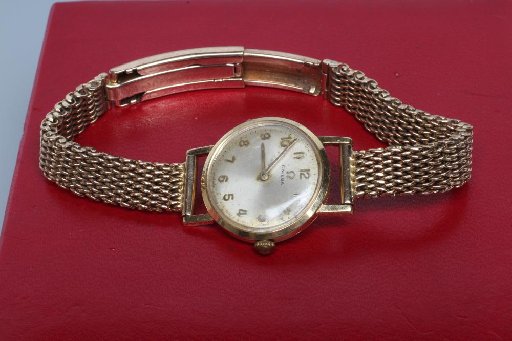 A LADY'S 18CT GOLD OMEGA WRISTWATCH Image