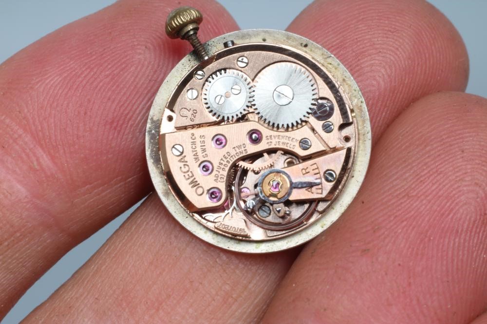 A LADY'S 18CT GOLD OMEGA WRISTWATCH Image