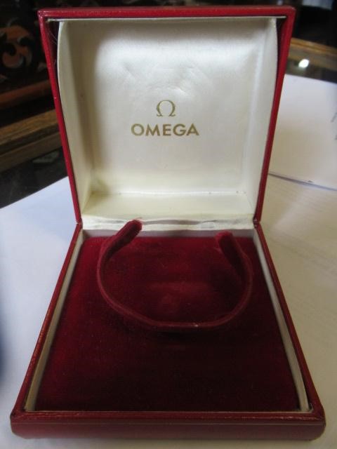 A LADY'S 18CT GOLD OMEGA WRISTWATCH Image