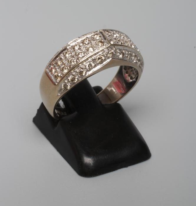 A DIAMOND HALF HOOP RING Image