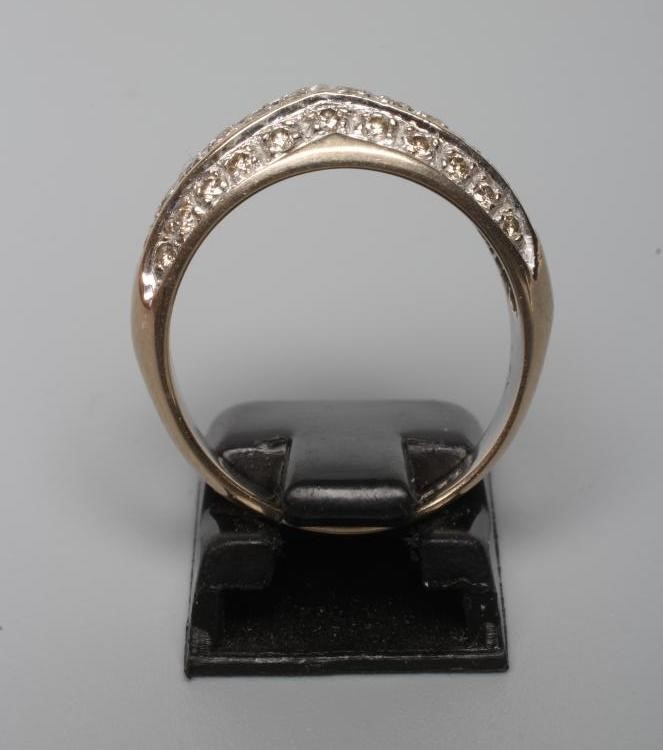 A DIAMOND HALF HOOP RING Image