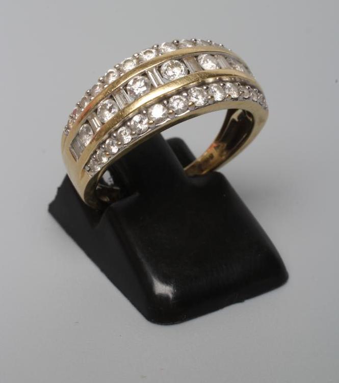 A DIAMOND HALF HOOP RING Image