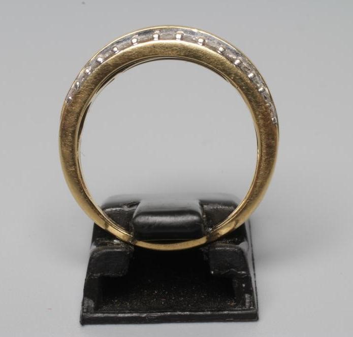 A DIAMOND HALF HOOP RING Image