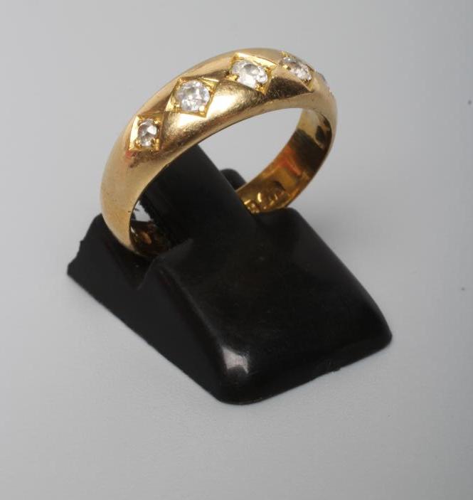 A VICTORIAN 22CT GOLD AND DIAMOND RING Image