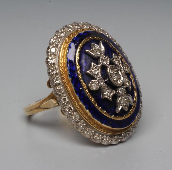 A DIAMOND AND ENAMEL DRESS RING Image