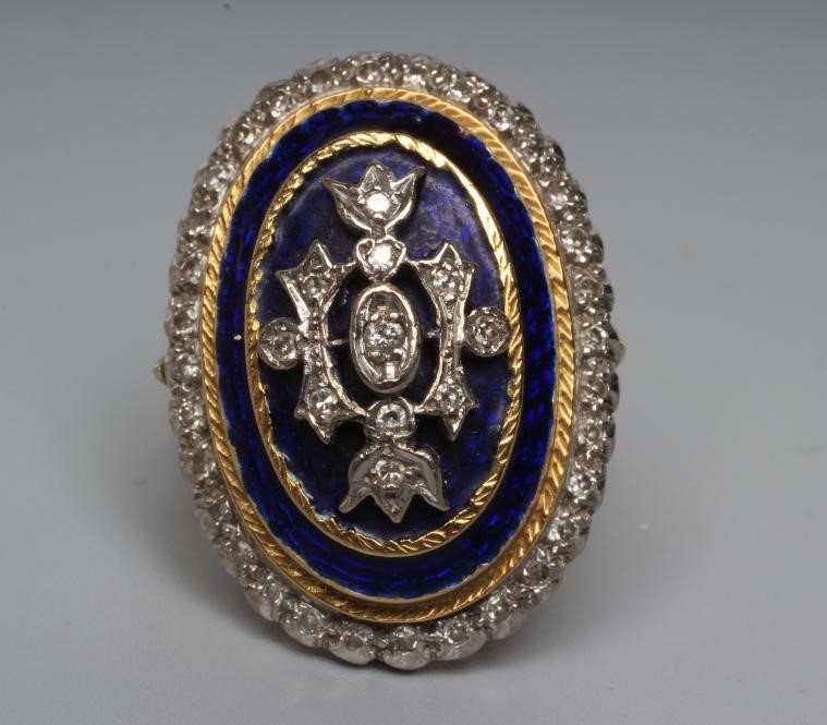 A DIAMOND AND ENAMEL DRESS RING Image
