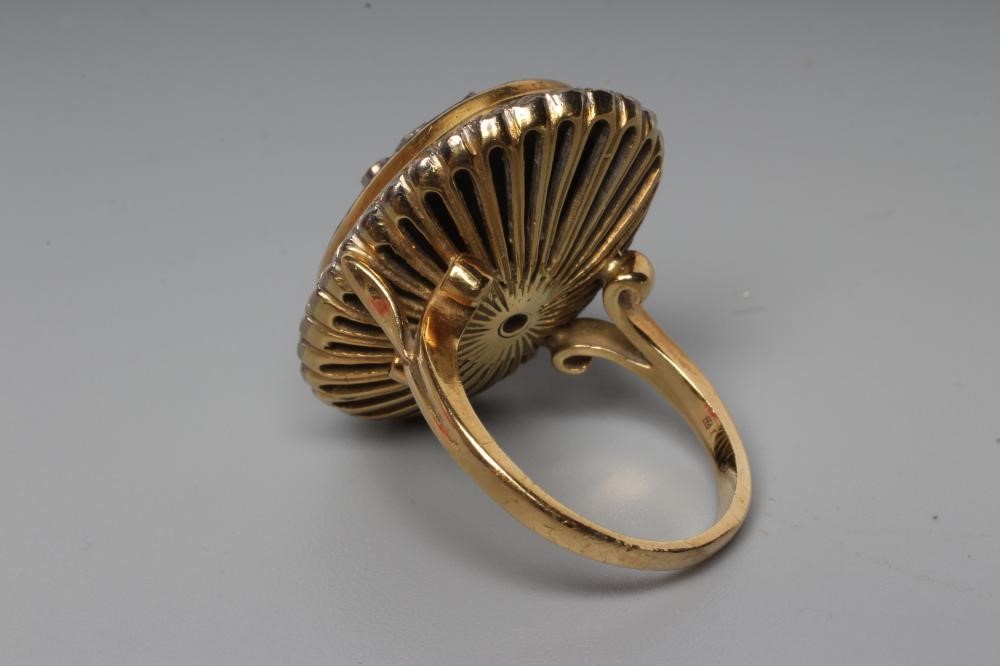 A DIAMOND AND ENAMEL DRESS RING Image