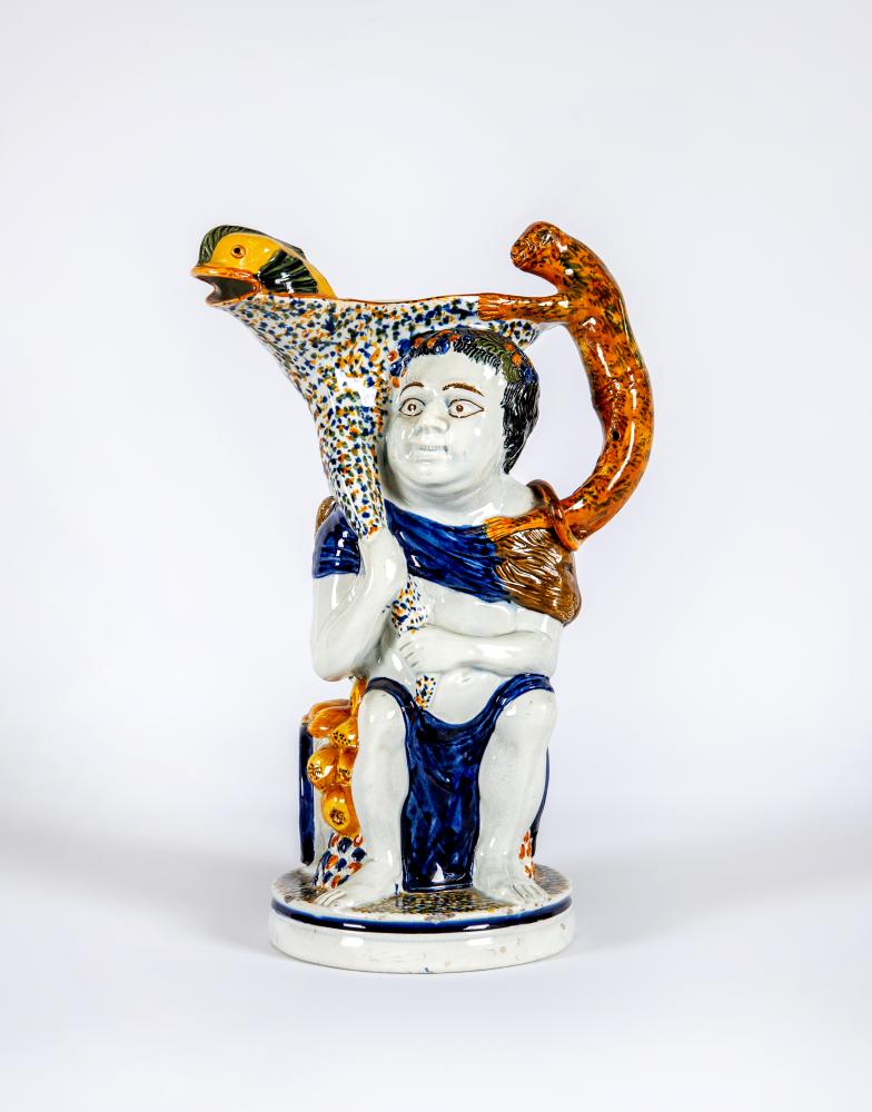 A RALPH WOOD PRATT TYPE PEARLWARE BACCHUS  AND PAN JUG Image