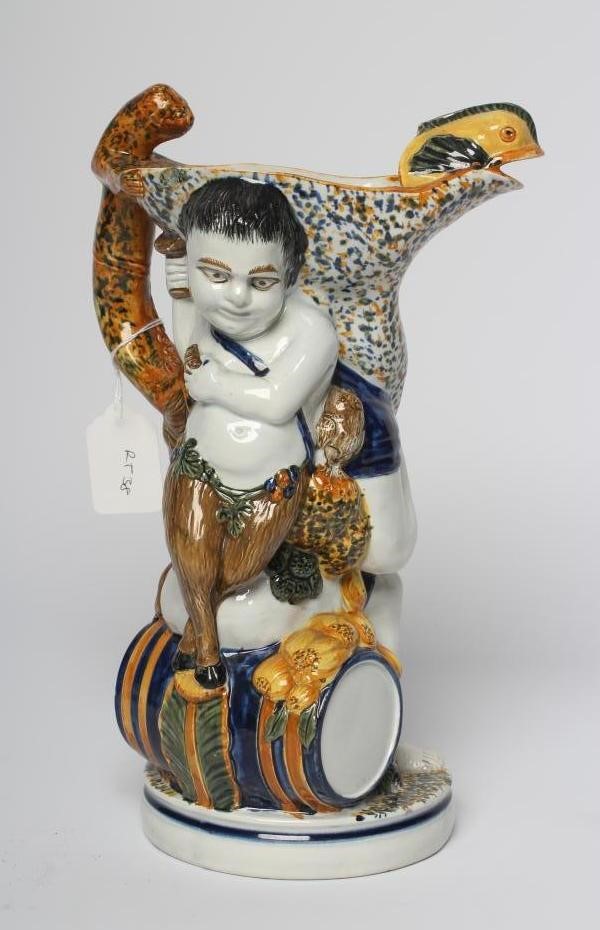 A RALPH WOOD PRATT TYPE PEARLWARE BACCHUS  AND PAN JUG Image